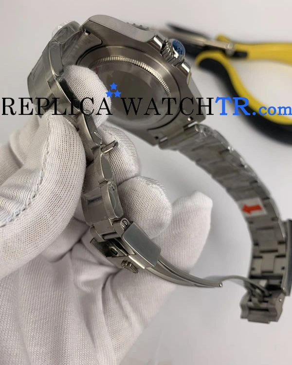 Second step in adjusting replica Rolex watch